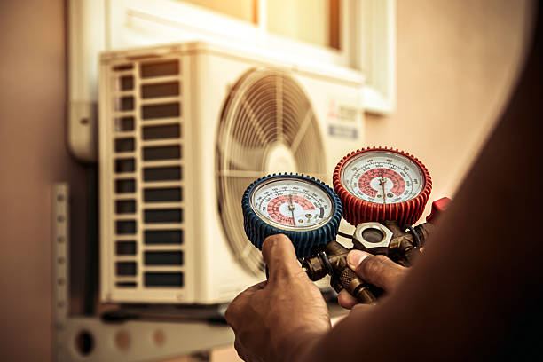 Professional Air Conditioning Service technician working in Arcade, GA